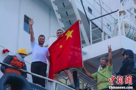 Ship crew wave the Chinese flag to escape Houthi attacks