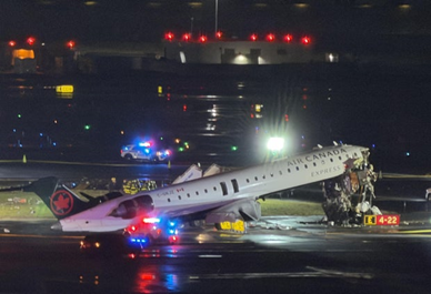 2 pilots killed when arriving plane and firetruck collide at New York's LaGuardia Airport, officials say